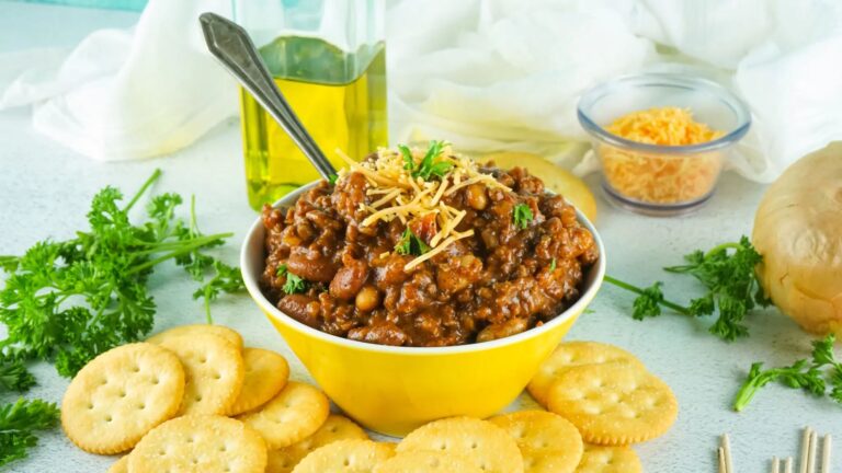 Smoked chili with cheese toppings in a bowl.