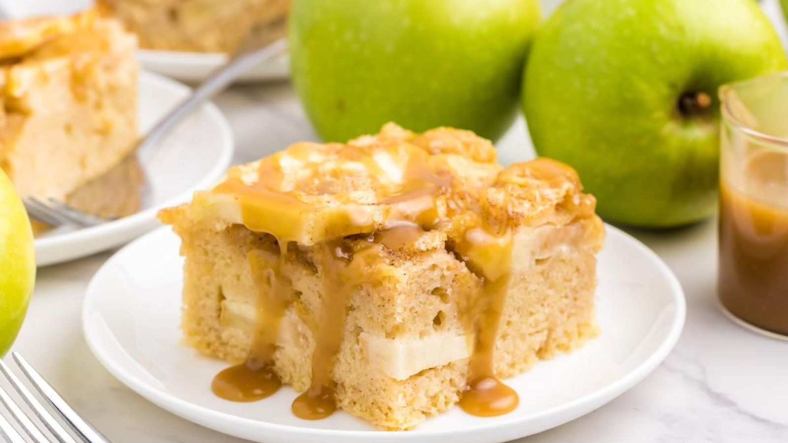Apple Sheet Cake with green apples on a plate.