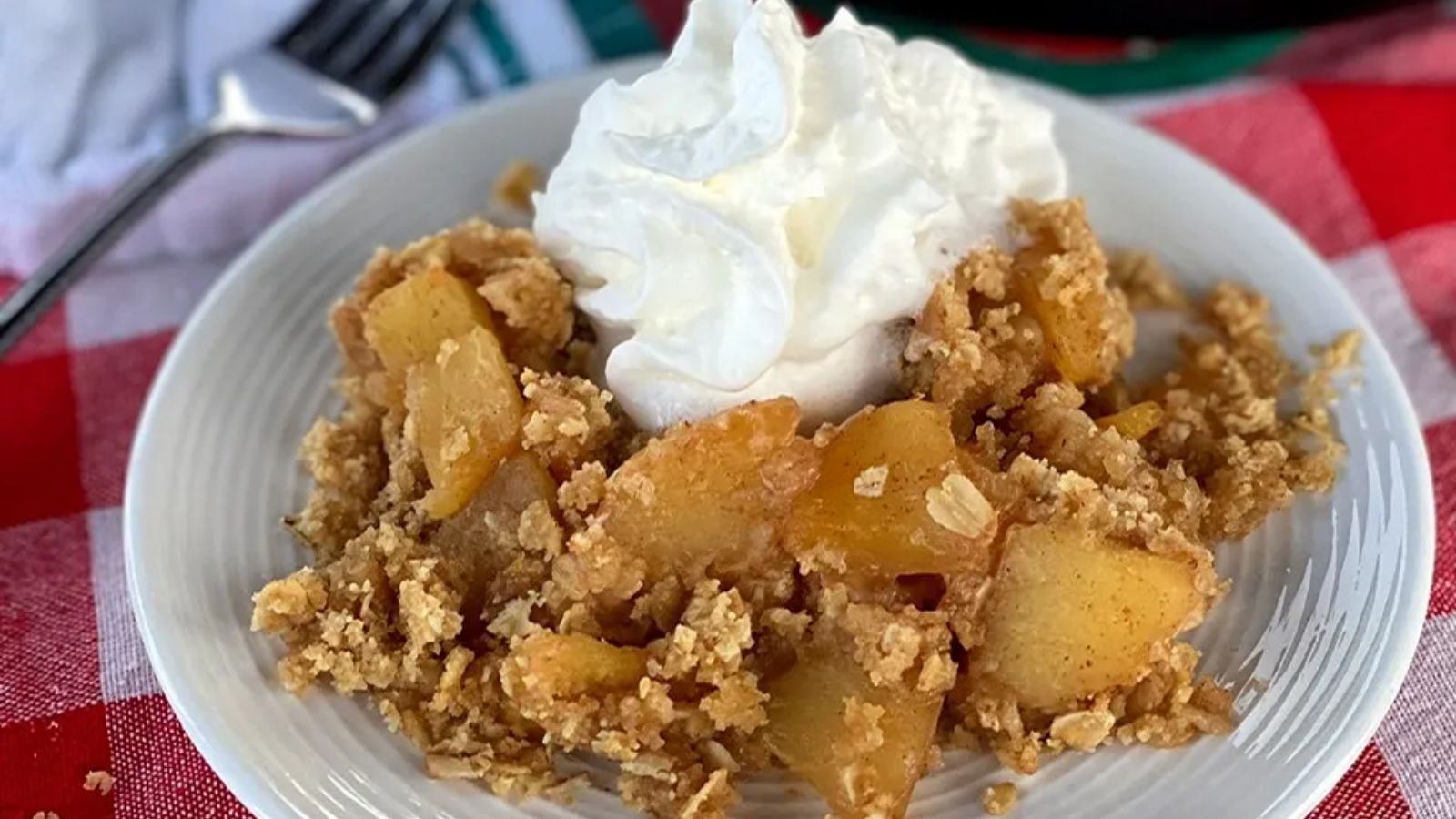 Close up shot of Cast Iron Apple Crisp on a plate.
