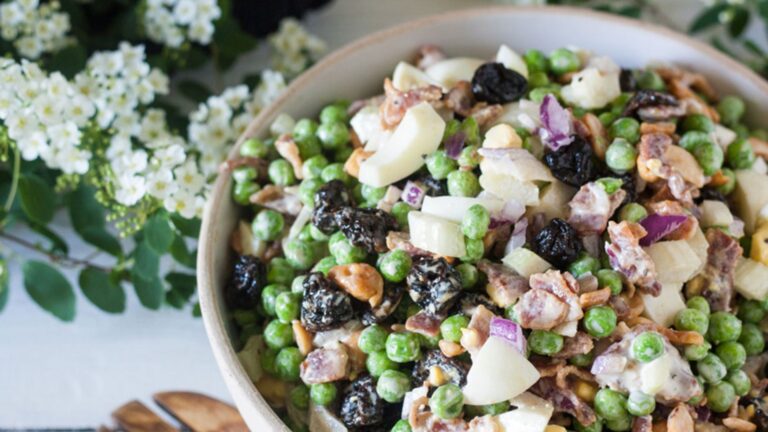 Large bowl filled with pea salad.
