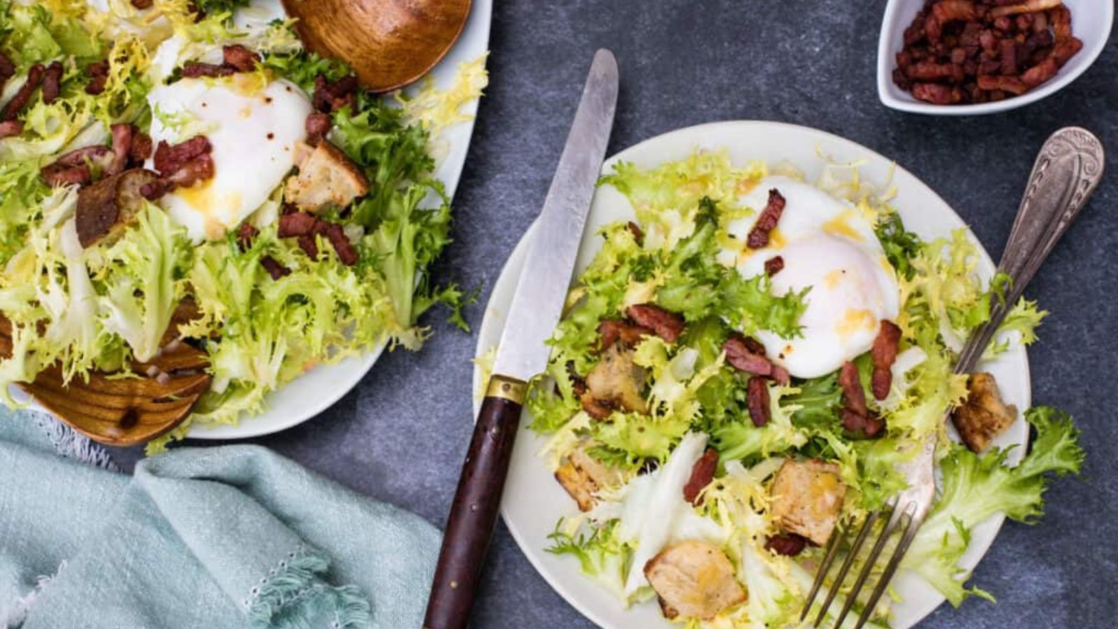 Top view shot of 2 Frisée Salad with Baguette Croutons in a plate.