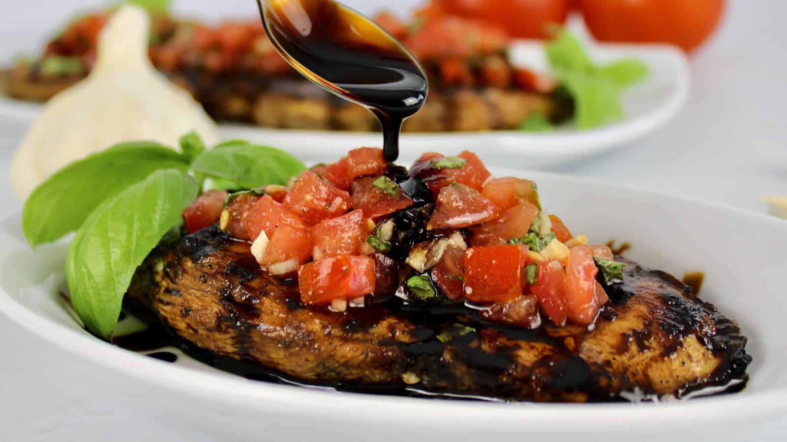 Bruschetta chicken on a plate.