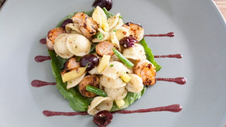 Shrimp pasta salad on a plate.