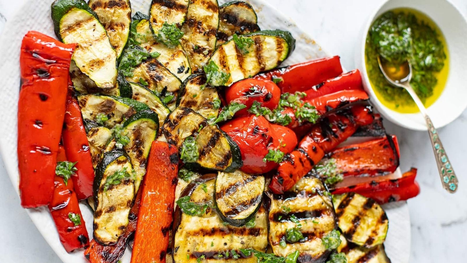 Top view shot of grilled vegetables on a plate.