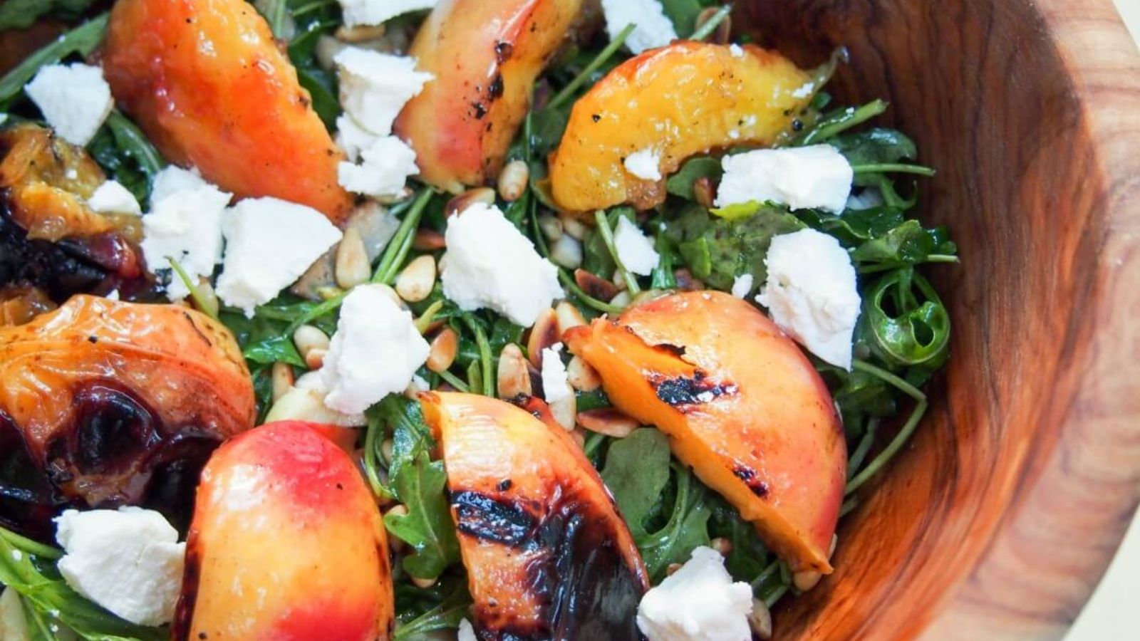 Close up shot of Grilled nectarine salad in a bowl.