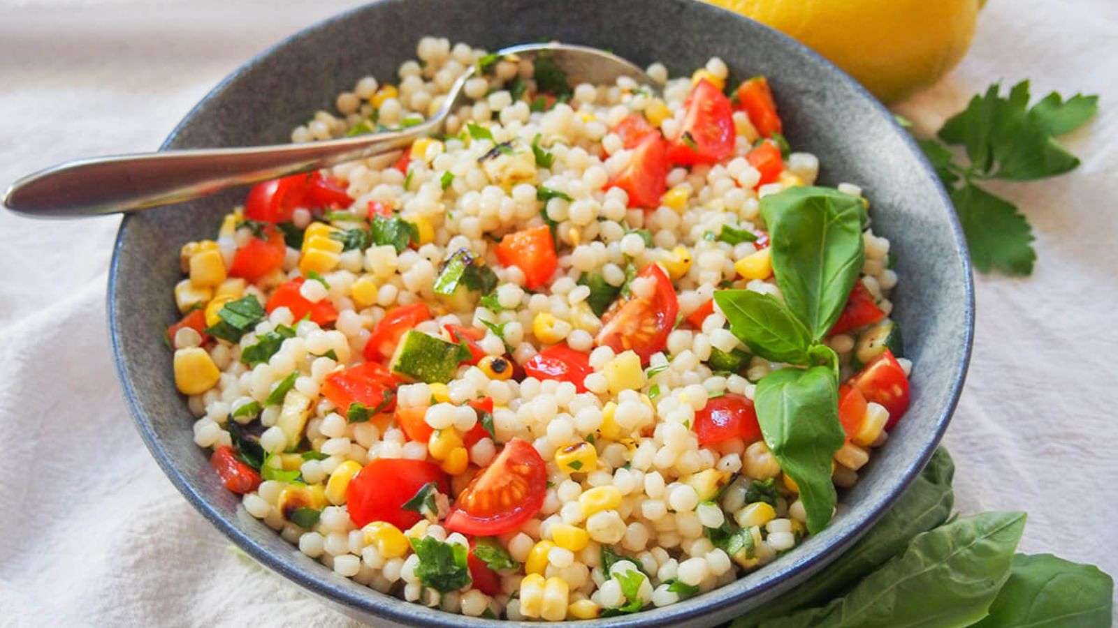 A bowl of couscous salad.