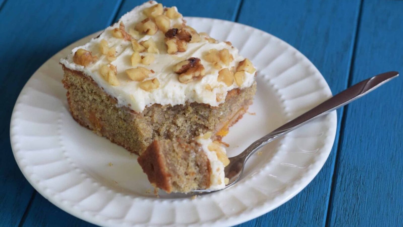 Persimmon Spice Sheet Cake with Maple Frosting on a plate.
