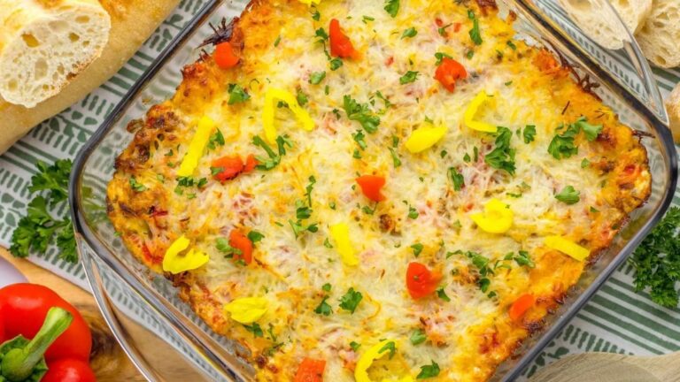 Sausage dip in a transparent dish.