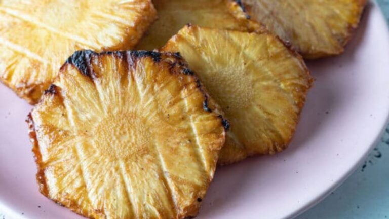 Close up shot of Smoked pineapple on a plate.
