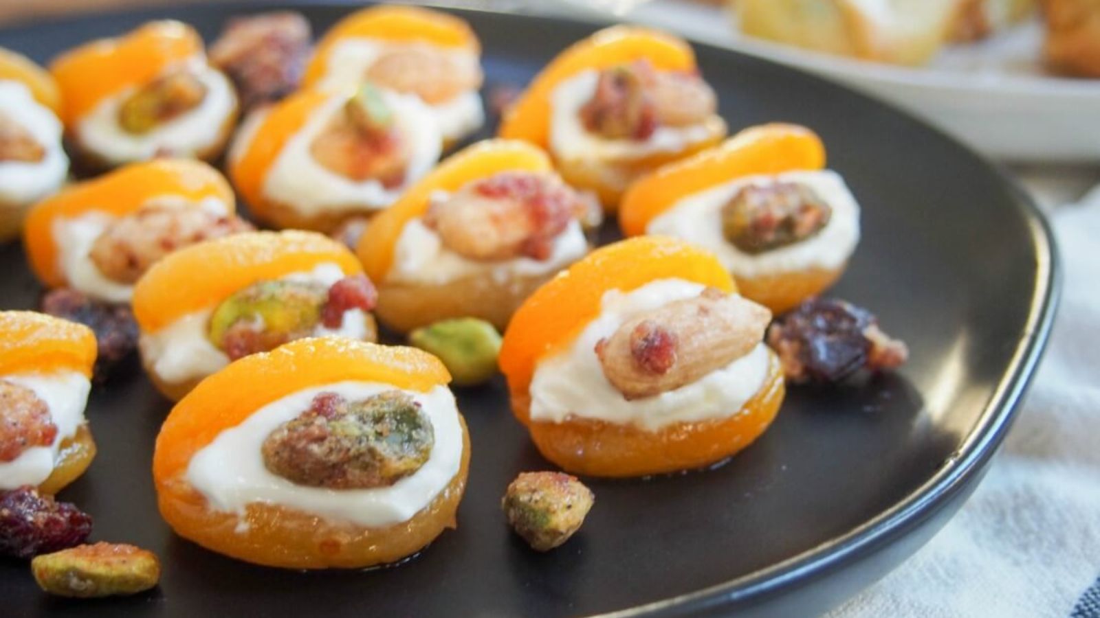 Turkish stuffed apricots on a plate.