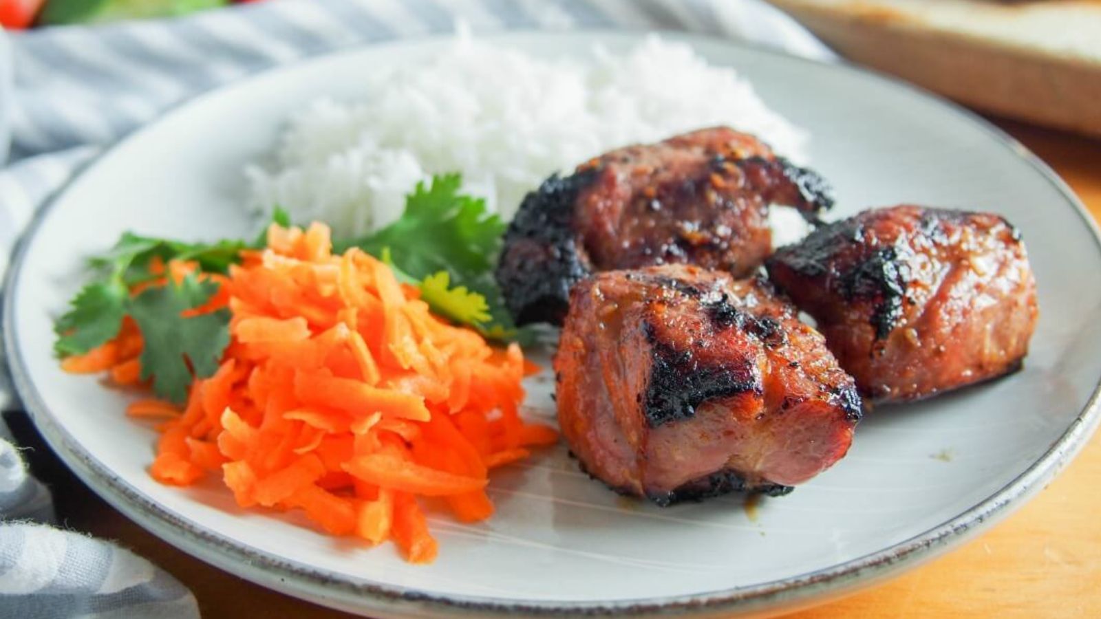 Lemongrass pork on a plate.