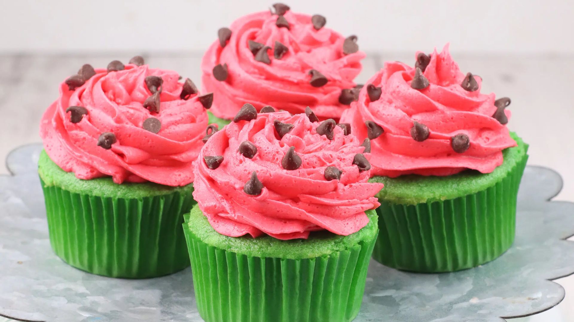Watermelon cupcakes with greeen cake and red frosting. 