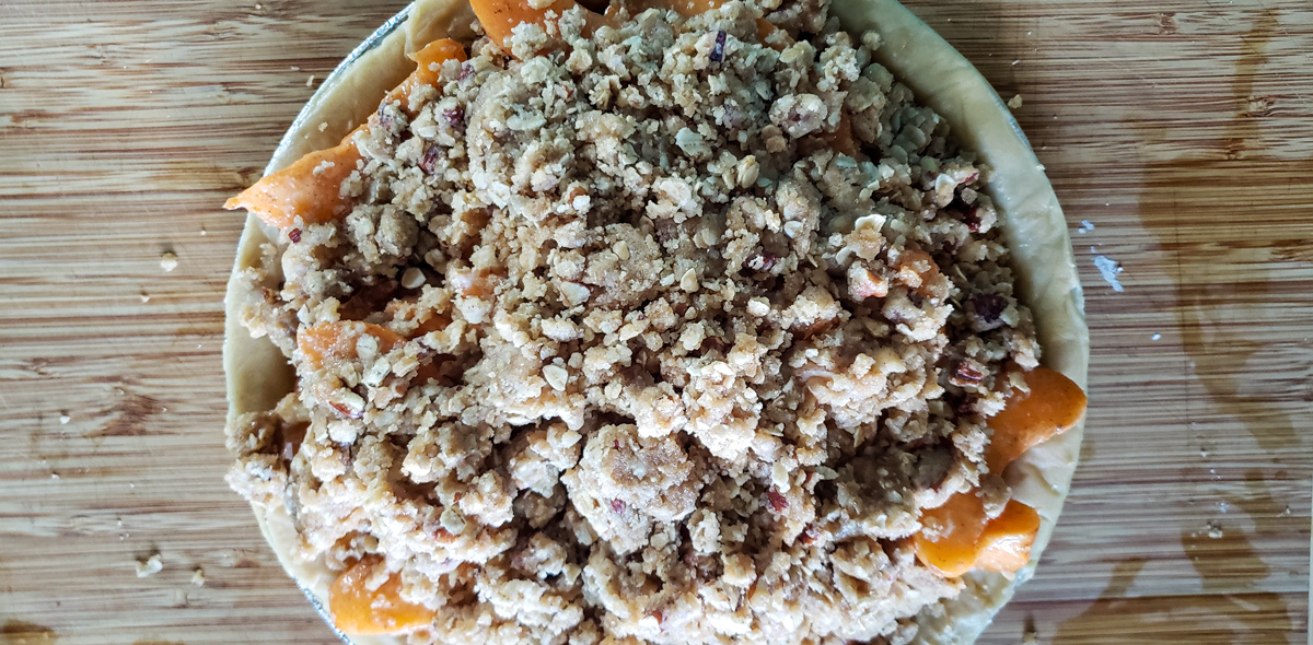 Crumb topping added to the top of the apricot filling.