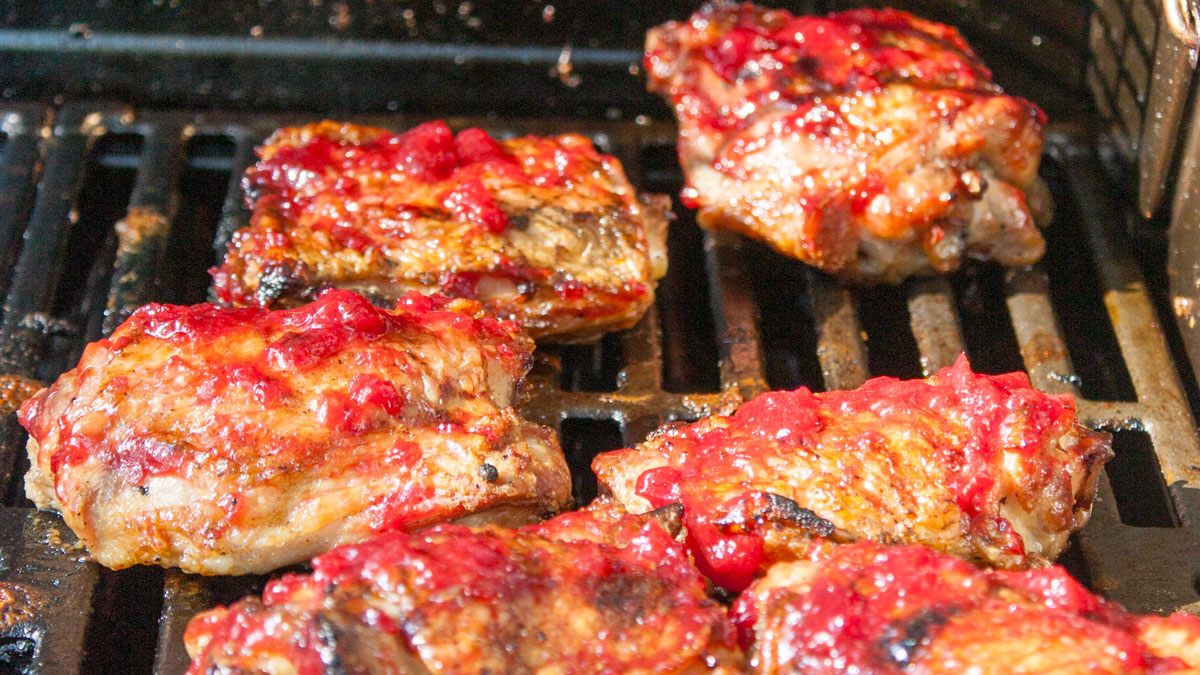 Chicken basted with plum sauce.