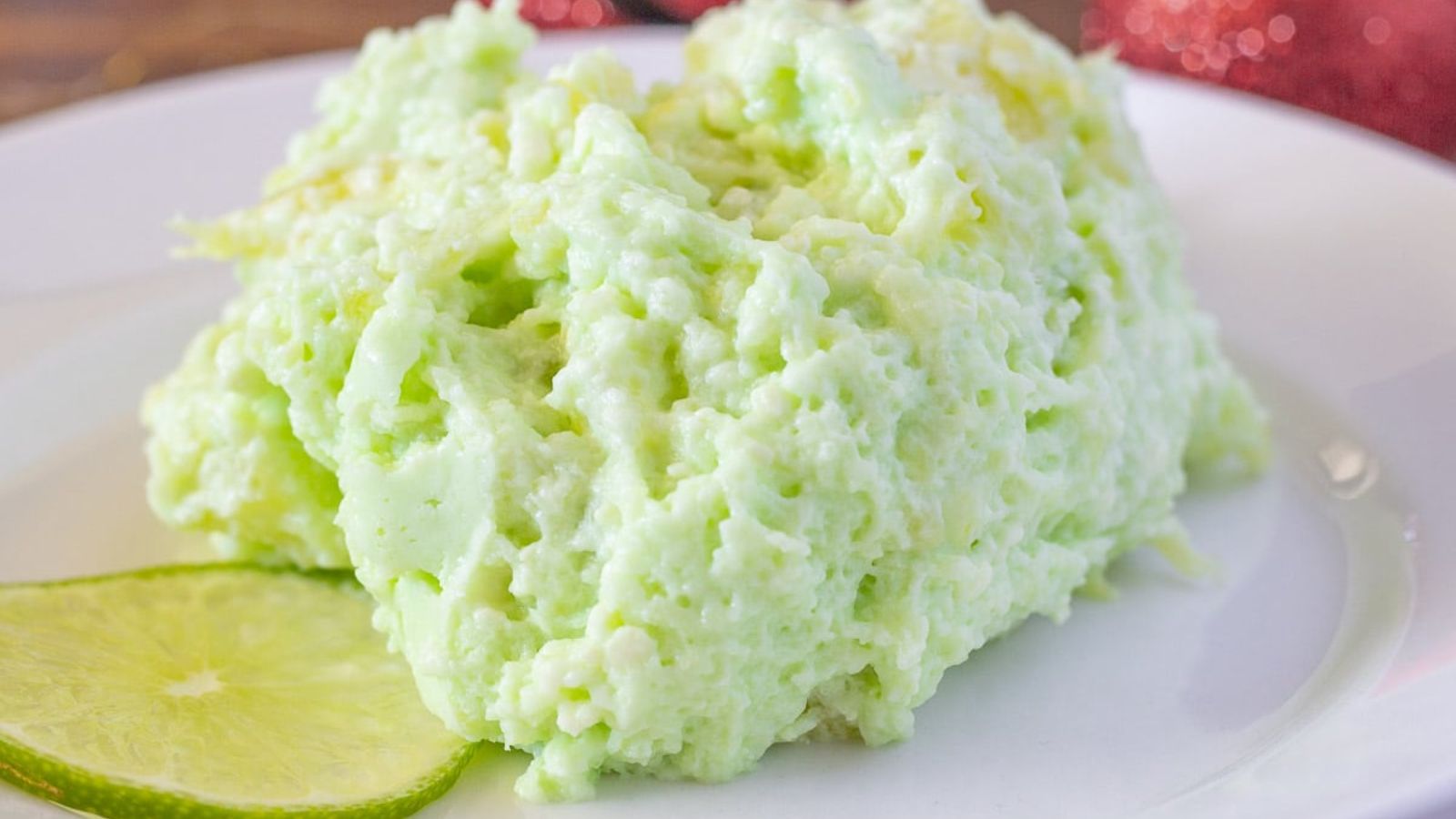 Lime jello salad on a plate.