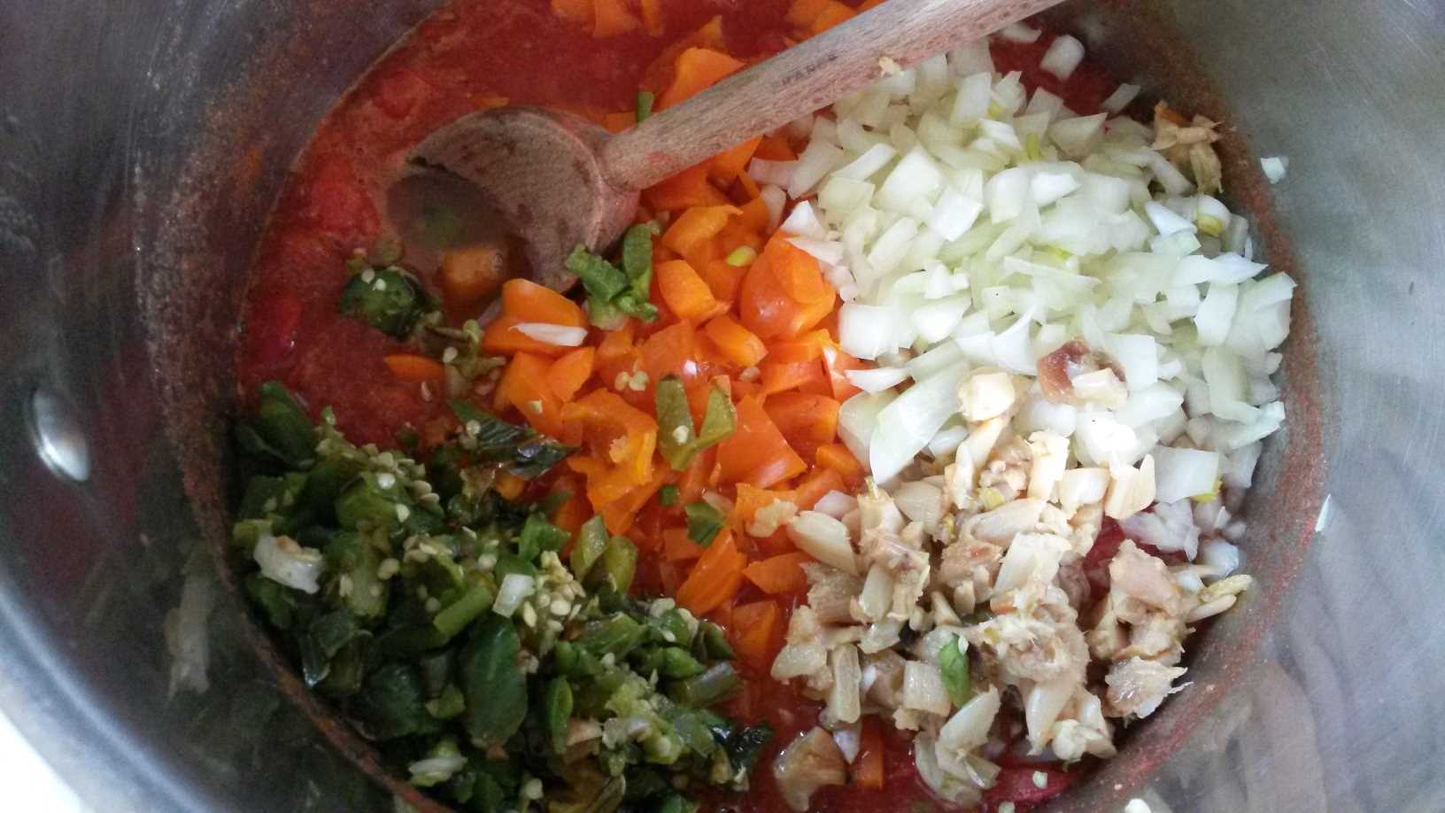 All ingredients on a large pot.