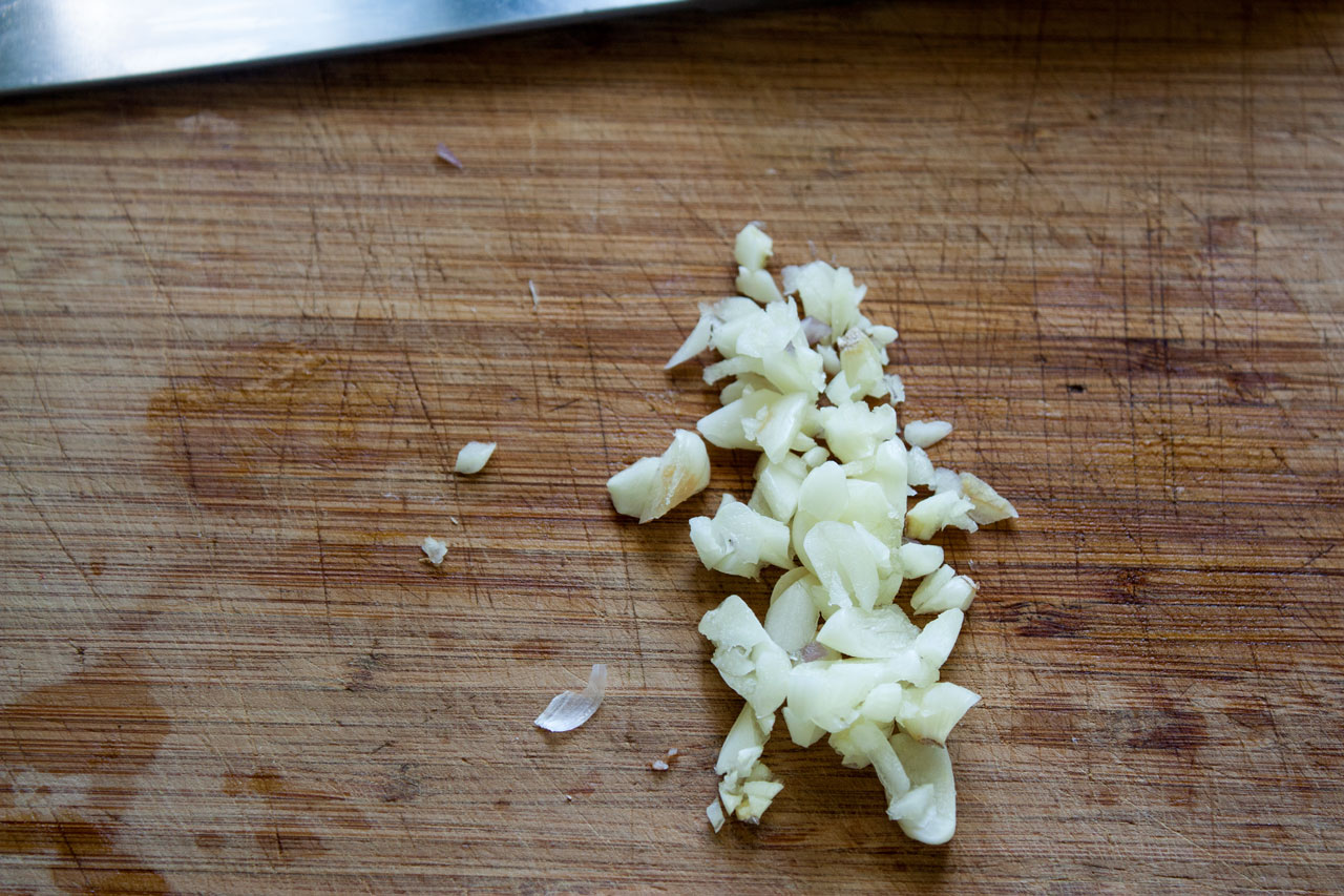 Minced garlic on the board.
