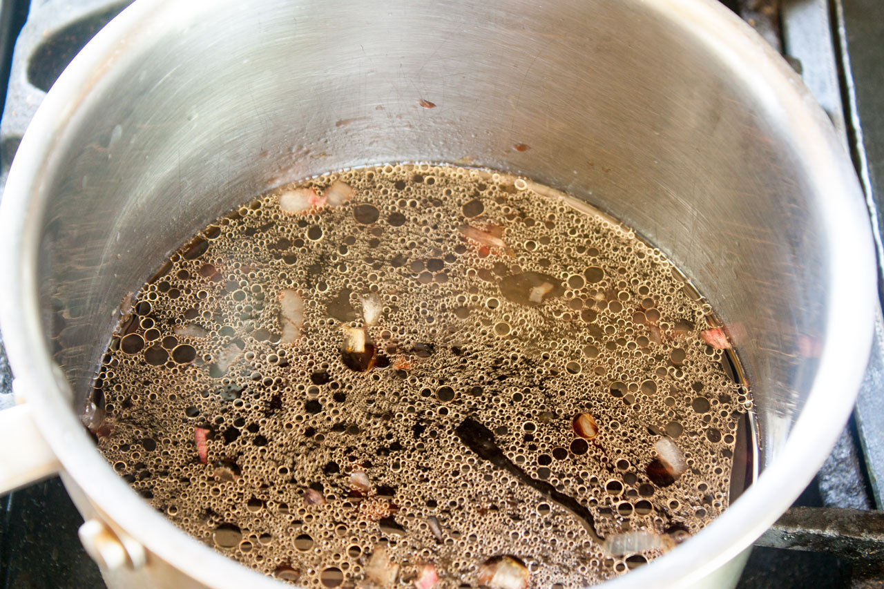 peppercorns, juniper berries and salt added to the pot.