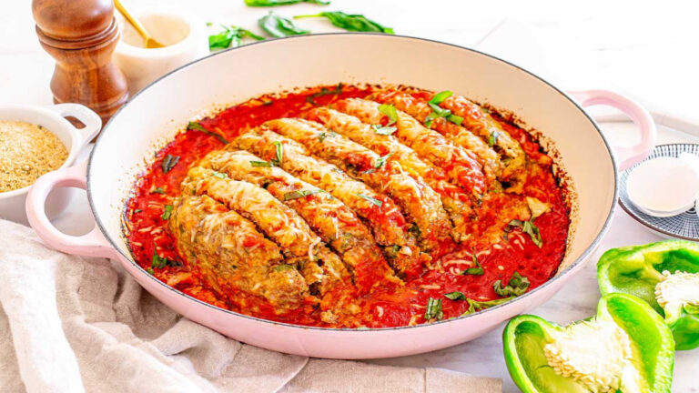 Italian meatloaf topped with marinara and cheese.