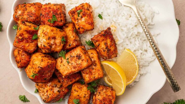 Salmon bites on a plate.