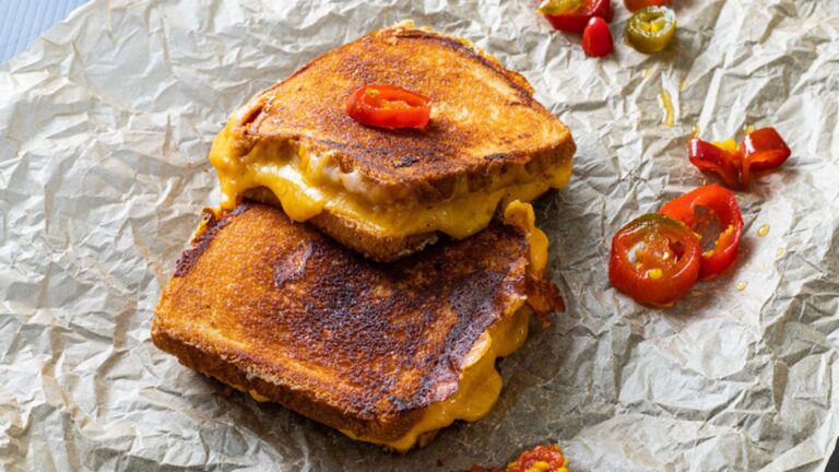Sandwiches on crumpled paper.