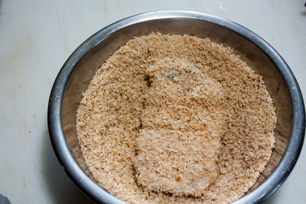 Breading the second side of the filet.