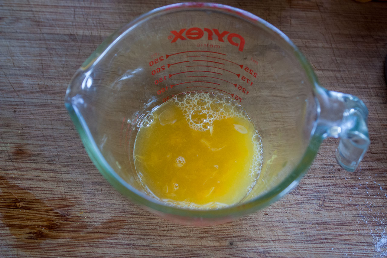 Juice poured into a measuring cup.
