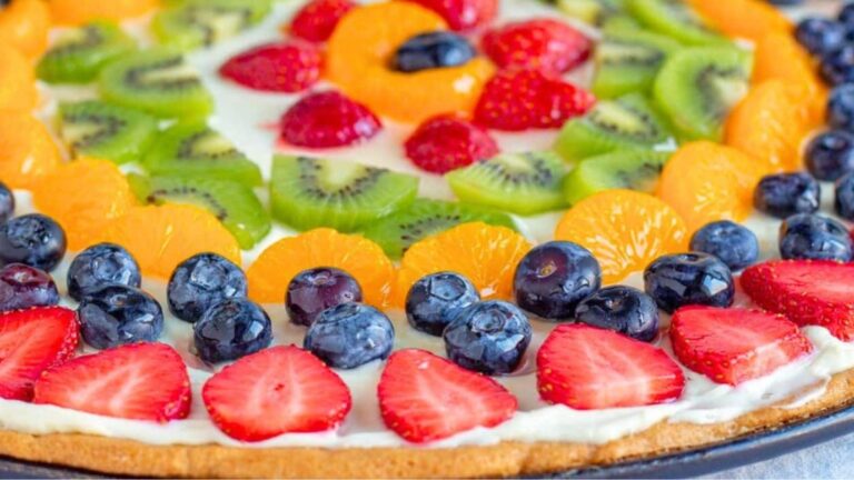 Close up of colorful fruit pizza.