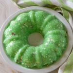 Green jello salad with cottage cheese and nuts.